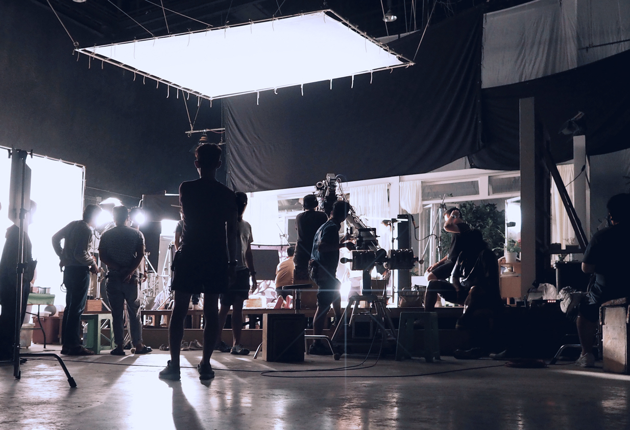 Filming on a sound stage. 